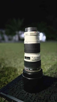 عدسه كانون  200/70 للبيع السعر 350 قفل  07740055060