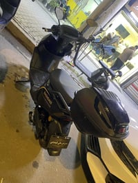 دراجة شحن • بطاريات على فحص • شارع ربيعي