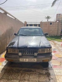 سياره كيا بونتيشه موديل 92 كيراومحرك مارك ونجي. رقم بغداد نكليزي جديد....