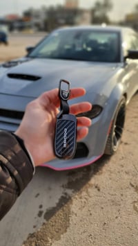 توفر غلاف بصمة جارجر كاربون فايبر عظم ، وليس ورقي  يوصلك نفس الي بالصو...