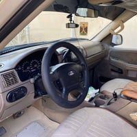 فورد اكسبلور 2005مال مزاد بيها كتاب 7 راكب تبريد 4 قطع  محرك 4000 6سلن...