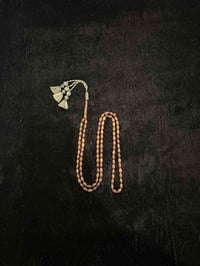 مسباح ٩٩ خرزة • خشب زيتون • توصيل كل المحافظات