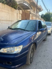 بيجو ٢٠٠١ • بدون حادث • رقم بغداد