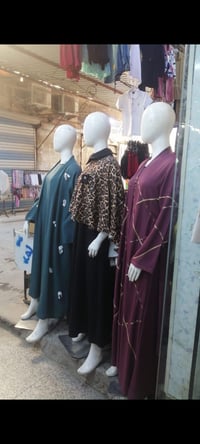 الناصرية شارع النيل • ١٠ قطع • ملابس