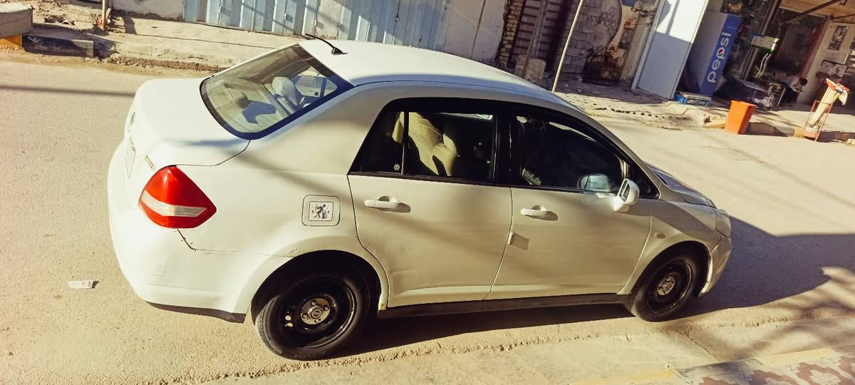 السلام عليكم نيسان تيدا مكفوله من ضربه موديل ٢٠٠٦ كير مكينه خير من الله تخم تير هذا رقمي ***********
