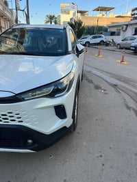تيوتا كورلا كروس ساز خليجي 2025 مكفوله رقم بغداد.  ماشيه 36KM محرك 4 س...