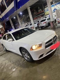 جارجر 2014  حديدة كفاله عامة  بيها فقط رش الجاملغ الخلفي بدون ضربط سبب...