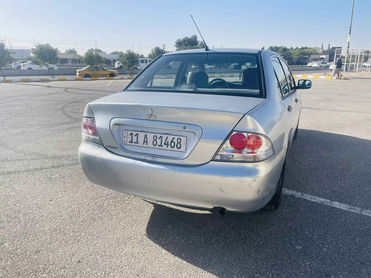 السلام عليكم لانسر 2010مكفوله بيها طخه بسيطه بلجاملغ الخلفي جوه قبق البانزين ومصبوغ فقط السياره ع وضع الشركه والسياره ممتعوبه ع ايد وحده ومالت. بيت السياره جاهزه من كلشي حداده امامي وخلفي كله جديد تخم تاير. باتري جديد تبريد ثلج كير  خير. من الله مكينه. بيه. خط بخار من 2010ممفتوح بيه شي 
سعرها 76وبيه مجال 
*********** مكاني. نجف السياره بسمي
