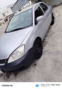 لانسر • ٢٠١٠ • انكليزي