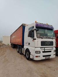 للبيع مان 2004 كير اوتوماتيك مكينه 410 ثلاجه  سبلت  تخم تاير راس وعربا...