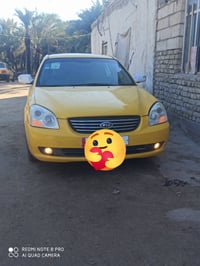 كيا اوبتيما للبيع السعر خاص07823507736