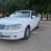 نيسان سني ياباني بليته زركه موديل 2009 السياره باسمي مكينه وكير مكفولا...