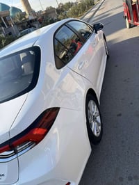 كورلا 2025 هايبرد خليجي للبيع  ماشية 23 الف  149 ورقة سعرها مكفولة عدا...