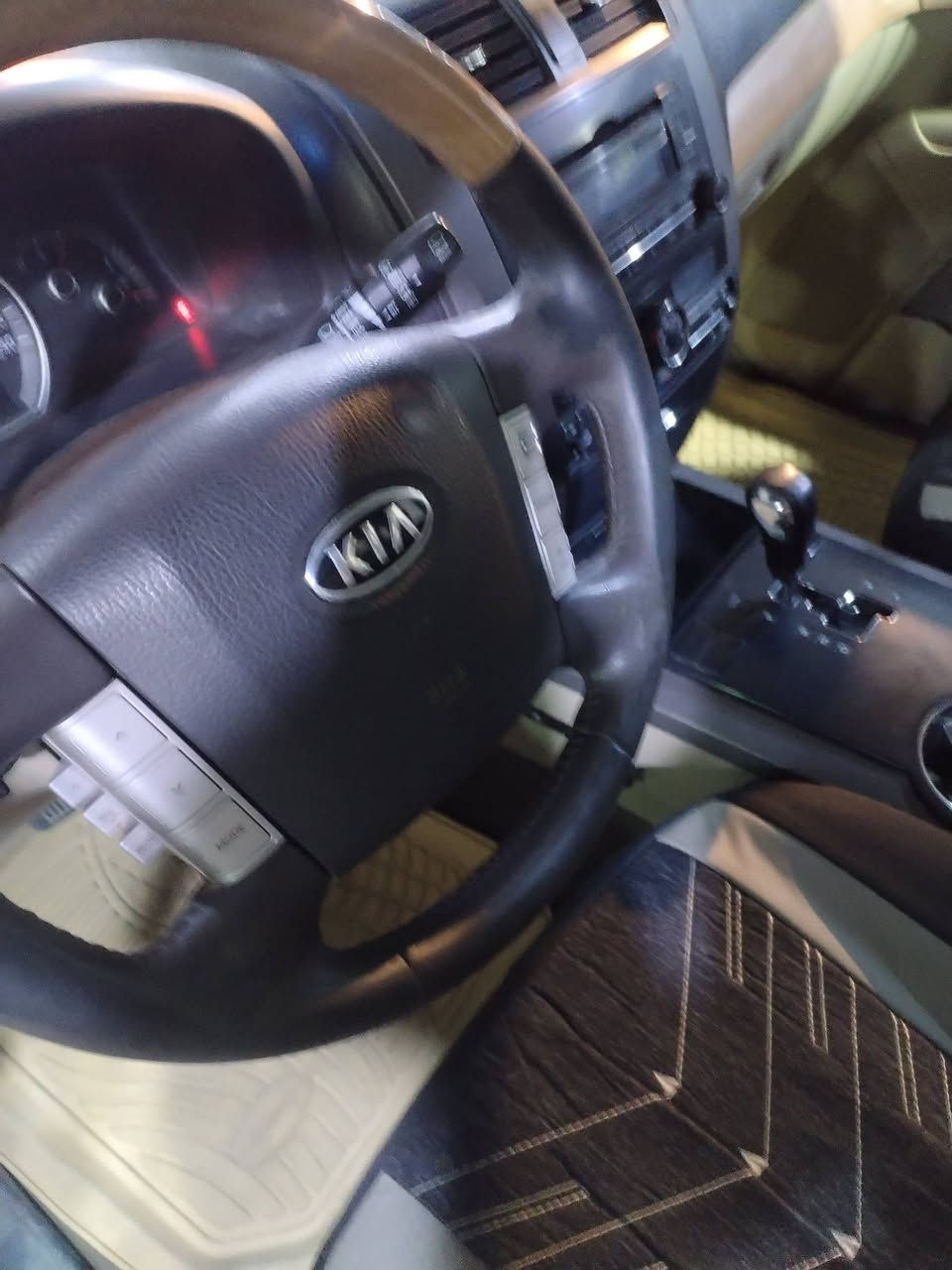 كيا مهافي ٢٠١٢ رقم انبار مقفوله من الصبغ نص فول ماشيه ١٨٠ الف كيلو كير محرك صدر كفاله تو ويل السياره سويج السعر ١٣٨ بيه مجال ***********
