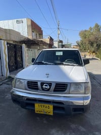 نيسان بيكاب • ٢٠٠٢ • كويسينجاك