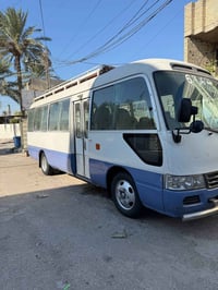 عندي كوستر 2004رقم بصره بيه مكانات صبغ بسيطه سياره كامله كير مكينه اكس...