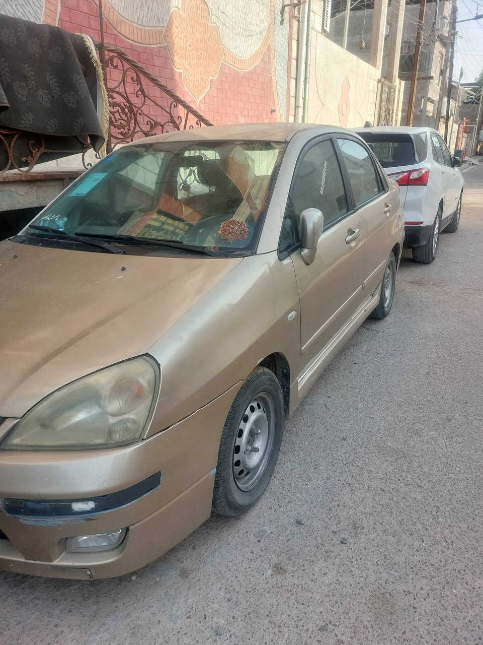 سوزوكي للبيع 
سلام عليكم سوزوكي ليانا للبيع قبل تفاصيل اخي شرط تحويل اذا تشتريها منا تحول منا ماتحول ما ابيع 
سيارة رقم بصرة انكليزي بأسمي كير ومكينه بلاد سيارة جاهزة باقي شغلات بسيطه نقصها حاليا باور وبوربرنغ خلفي لان من تمشي ٦٠ وفوق يطلع صوت دوية ودبل الأمامي الأيسر بدة يطلع صوت خفيف بطسات وسماعات عاطلات عدا هذن سيارة كامله كير محرك تبريدها شغال شاشة اندرويد كامرة خلفية حداده كلها نفظتها قبل ٣ اشهر بس الي كتلك بيه لان جان مابيه شي بوقتها سعر ٥٢ وبيها مجال حك جية مكاني بصرة المطيحه وهذا رقمي بيه واتساب ***********
