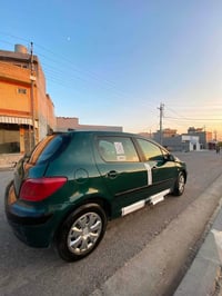 بيجو • ٢٠٠٥ • توماتيك
