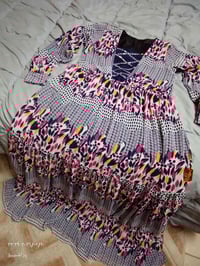 فساتين • زيتوني قياس ٤٨ • جرجيت قياس ٤٤-٤٦