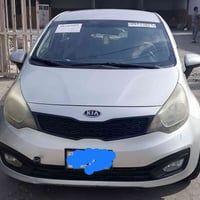 كيا ريو للبيع او معارض مع تاكسي  07780572932