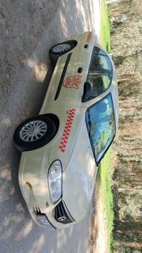 نیسان سەنی 2010 رەش پۆش پیشی کەپسە پشتی جەمپەکی خەفیفی هەیە نزخ93 0750...