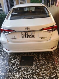 كورولا خليجي هايبرد 2024 فول مواصفات رقم بغداد باسمي ماشيه 32 سياره مق...