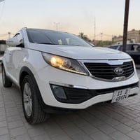 كيا سبورتج خليجي رقم بغداد الجديد سياره نضيفه وجاهزه محرك وكير شرط تبر...