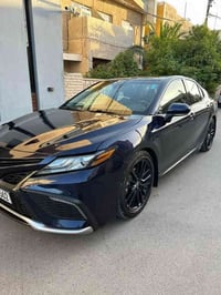 كامري XSE موديل 2022 هايبرد رقم بغداد الجديد  تحويل ثاني يوم  فول مواص...