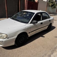 كيا سبكترا موديل ٢٠٠٣ كير عادي للبيع كامل تبريد شغال سعرها ٤٥ وبيها مج...