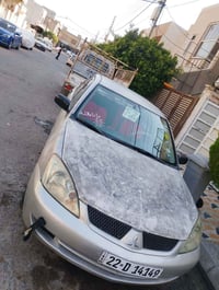 لانسر ٢٠٠٧ • شاشة آيباد • فحص ٢٠٢٩