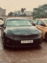 كيا k5 موديل ٢٠٢١  السيارة عارضها ب١٥٧ ورقة وبيها مجال ماشية ٧٧ الف مي...
