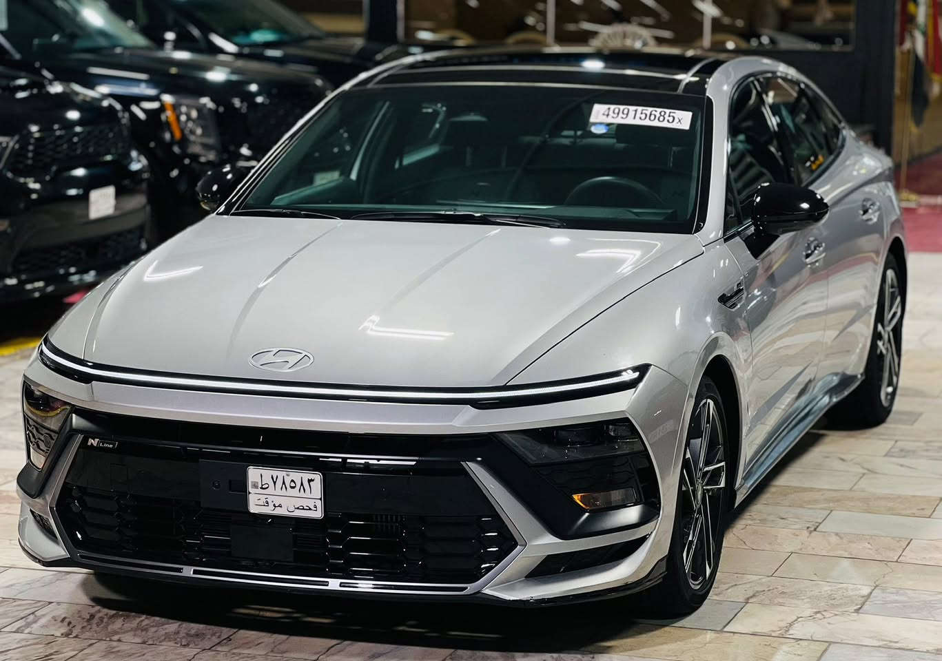 ‎سوناتا N line 2024 
‎السيارة كلين ..فقط بارد بسيط 
‎موصفات فول 1/1
‎حجم المحرك 2.5 تيربو 
‎ماشية السيارة 5 مايل
‎مفتاح التشغيل بصمة 
‎حساسات أمامية و خلفية 
‎رادار خلفية توقف ذاتي 
‎لايت زينون + LED متصل 
‎بك لايت LED متصل 
‎دخول بصمة ذكي 
‎هاند بريك كهرباء  
‎دشبول شاشة ديجيتال متصل 
‎شاشة Apple Car play and Android Auto 
‎كاميرا دوارة تصوير 3 وضعيات
‎الانارة الداخلية LED ٦٤ لون متغير 
‎مقود جلد 
‎ارضيات كاعيات وصندوق اصليات
‎شفتات مقود مثبت السرعة Cruise 
‎المودات والاوامر الصوتية 
‎شاحن هاتف Wireless 
‎مخرج منفذ الطاقة type C
‎المقاعد حضن سبورت جلد + شامو وحرفN
‎حركة المقاعد الأمامية كهرباء 
‎تبريد شاشة مناخين منفصلين 
‎تطعيم الدواخل كاربون فايبر سلفر
‎مكان السيارة نجف 
‎السعر 240 وبيها مجال
‎رقم موبايل / ***********
