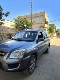كيا سبورتج موديل 2010 السيارة جاهزة وكاملة من كلشي كير ومكينه وتبريد ك...