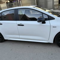 كورلا 2025 شكل الامريكي  رقم بغداد مواصفات GR  _كشن سائق كهربائي _تحدي...