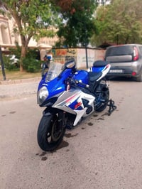 GSXR 1000   بحالت الوكاله ماشيه 30الف حقيقي  بيه برمجه 3مودات اكزوز بر...