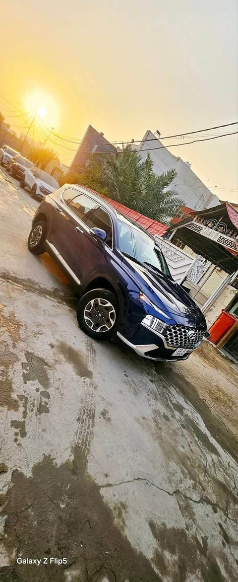هيونداي سنتافي هايبرد موديل 2023 امريكي 
 2023 HYUNDAI SANTA FE BLUE HYBRID 
محرك 1.6 تيربو هايبرد
وارد امريكي 
ماشية   66،000KM  
. دخول وتشغيل بصمة 
.باب الخلفي كهرباء 
.شاشة كبيرة 
.حساس خلفي  
.كاميرا رجوع 
. نظام التحكم بوضعيات القيادة Eco , Normal , Sport 
.نظام مانع انغلاق  المكابح ABS
.أضوية نهارية LED
.رادار مانع تصادم 
.تحديد مسار 
.بروجكتير 
.كير بيانو 
.مكيف هواء اوتماتيك للمنطقتين 
.مقاعد جلد 
.مقاعد امامية + الخلفية كهرباء
.مقاعد امامية تدفئة 
.ستأئر جانبية 
Apple car play & android auto 
. كشافات ضباب امامية 
.ازرار تحكم عبر المقود 
. قفل مركزي 
.مثبت سرعة 
.رقم بغداد مشروع وطني 
. السعر (235) ورقة
ملاحظة: حادث السيارة بنيد مبدل ومصبوغ 
————————————
لاستفسار
*********** ابو علي بغداد, العراق

