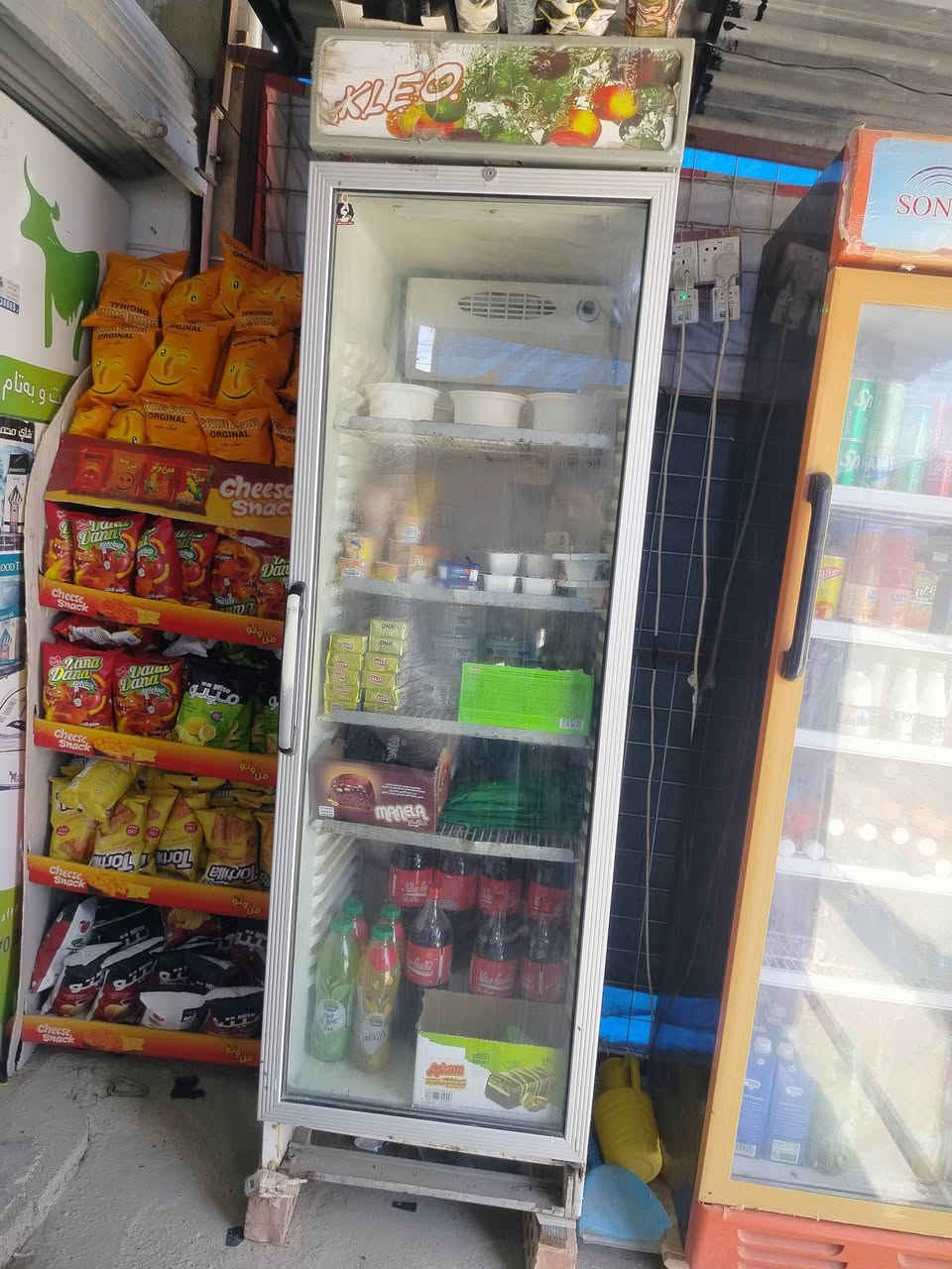اغراض محل للبيع ثلاجه ورفوف 
          ***********.
