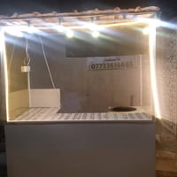 كشك البيع السعر ب 300 وبي مجال الاتصال على رقم 07733614665