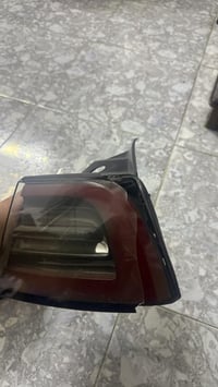 بك لايتات تسلا 3  موديل ٢٣ بيهن كسر بسيط  بالوجه بس شغالات ممكن تاخذ م...