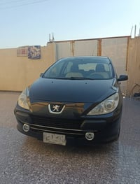 بيجو ٣٠٧ • رقم بغداد • محرك خابط