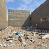 قطعة أرض ٢٥٠م • كوت الحجاج • واجهة ١٢٫٥م