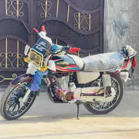 دراجة نارية • هوندا • مكينة 200