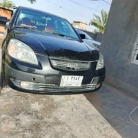 كيا ريو 2009 محركها خير من الله تبريد شغال كير عادي نضافه فول كهربائيا...