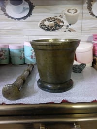 هاون ارتفاع 20سم وزنه 10كغم