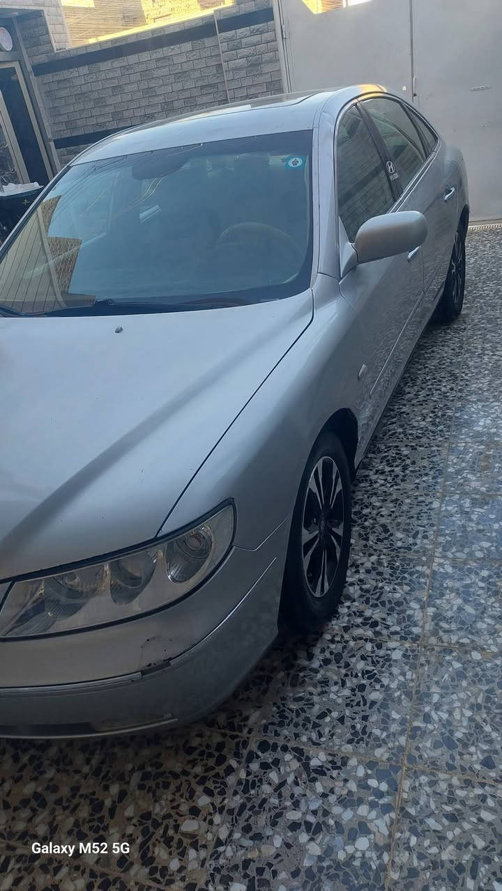 السلام وعليكم هونداي ازيرا موديل ٢٠٠٧ مراوس بسوناتا مقدس وانطي فرق شي قليل مكاني الحسينيه سياره كامله رقم نكليزي بغداد بسمي محرك وكير بعده بلضمان *********** مصبوغه عام
