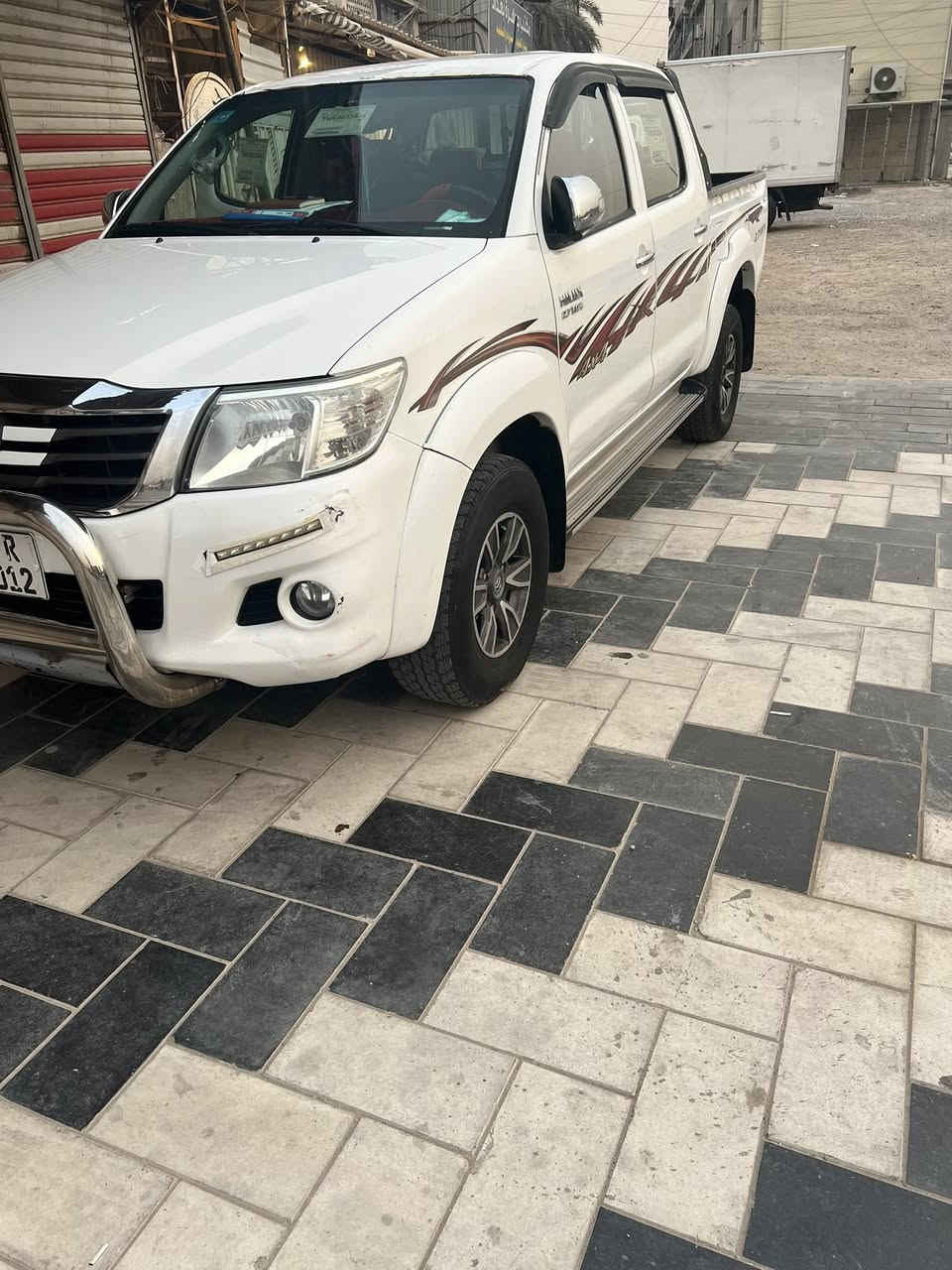هايلوكس موديل 2014 فور ويل 4X4 مكفولة من الصبغ رقم بغداد الانكليزي الجديد صدر كير دواخل مكفول الموقع بغداد الغدير السعر السونار مرفق 210 استفسار ***********
