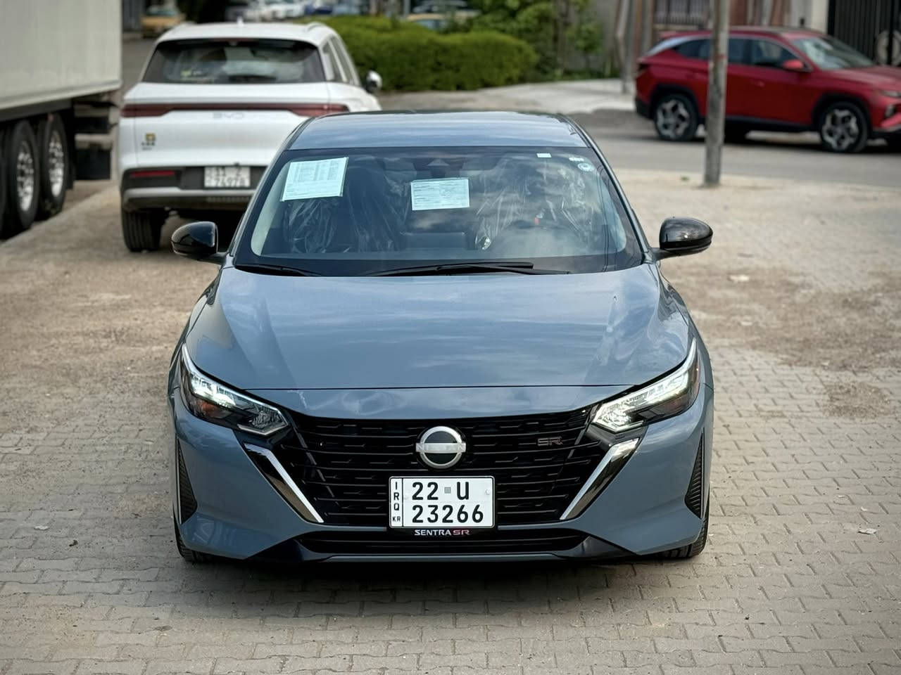السلام عليكم  #سينترا ***********
نيسان سنترا 2024  SR لون السياره سموك ( سمنتي🩶) وارد امريكي🇺🇸 حادث بيند سطحي نفسه مصلح بدون تبديل اي قطعه بدون دواخل لغد شاصي بدنه براكيت راديترات غاز كله بلادي شركه شرط الدعاميه بدون صبغ
ايرباك ستيرن وراجع سستم بلادي
فقط هذا الحادث باقي السياره كفاله محرك كير 
حداديه تخم تاير دينار مابيه مصرف تراي زيرو
والسياره مرايه احله من الصور ومتعوب عليها
بدوون شخوط ولا رصعات 🤗
رقم اربيل الجديد هزه وفحص جديد سنويه لحد 2031 تريد وكاله او تحويل موجود
محرك 2000 /4 سلندر 
بصمه عدد2 + تشغيل عن بعد⚡️
لايت زينون بلادي عالي ناصي
رادارات جانبيه تحديد النقطه العمياء ⚠️
رادار خلفي ‼️
رادار امامي ❗️
تحديد مسار/ سياقه ذاتيه 
اوتو بريك /توقف ذاتي عند الاقتراب 🚳
ستيرن حرف D
تدفئه 🌡️ كشنات 
تبريد شاشه لمس مناخ منفصل
شاشه كبيره تدعم 📲Android Auto/car play
خرائط Gps📌
كامره خلفيه 📷
نظام ايكو وسبورت
مري اسود+ اشاره💡
فول تحكمات ستيرن 
كروز مثبت سرعه
ويل كب كروم 18🛞
حساسات خلفيه + سبايدر بلادي
حساس اطارت 
شاشة ظبط واعطال بل دشبول
منافذ USP/ 12V /Tip C Aux
السياره جاهزه بدون نواقص اي مصرف مابيه 
‏ ‭0777 200 0589‬ شراي اتصل
