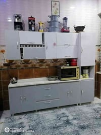 السلا عيكم كاونتر مترين ونص +سنك متر ونص طول كامل 4متر  خشب يج دي إيف ...