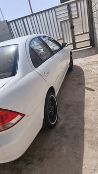 نيسان سني 2008بيه ضربت بجم خفيفه سياره بسمي السعر85بيه مجال 0771265858...