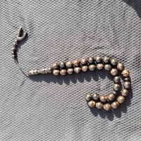 المرجان الأسود • ٣٣ حبه • ١٢٫٥×١٤ ملم